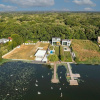 🏡 Reședință modernă 400 mp utili, teren 1.200 mp – deschidere directă la lac