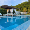🏡 Reședință modernă 400 mp utili, teren 1.200 mp – deschidere directă la lac
