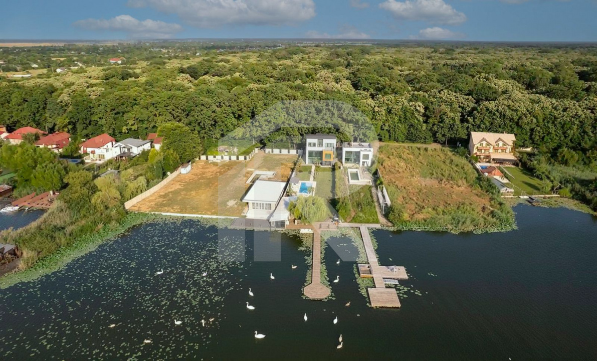 🏡 Reședință modernă 400 mp utili, teren 1.200 mp – deschidere directă la lac