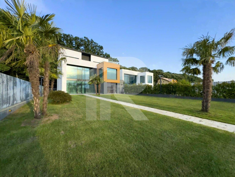 🏡 Reședință modernă 400 mp utili, teren 1.200 mp – deschidere directă la lac