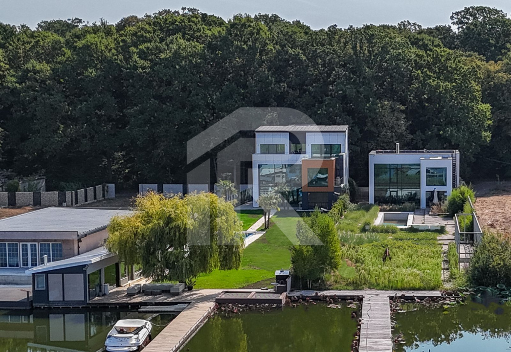 🏡 Reședință modernă 400 mp utili, teren 1.200 mp – deschidere directă la lac