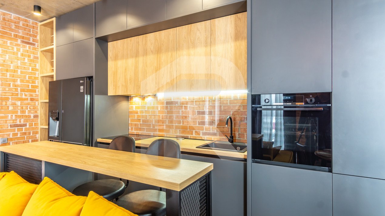 2 camere complet mobilat si utilat, parcare subterana, incalzire in pardoseala