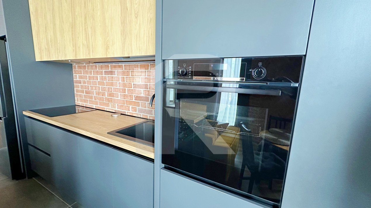 2 camere complet mobilat si utilat, parcare subterana, incalzire in pardoseala